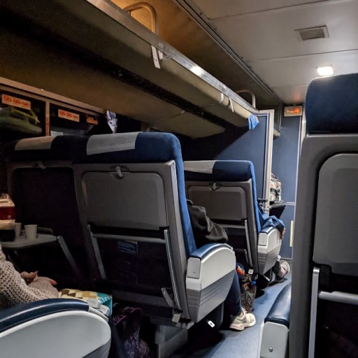 A Coach Car with passengers.