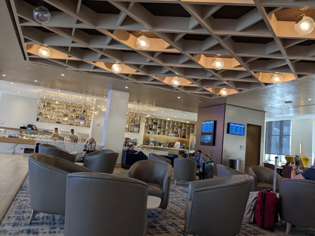 A room with chairs, and a food area, for snacks.